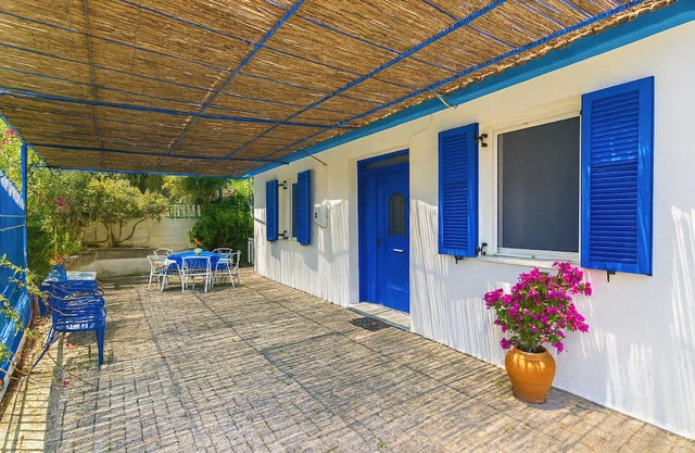 Blue White Apartments - Traditional Village House