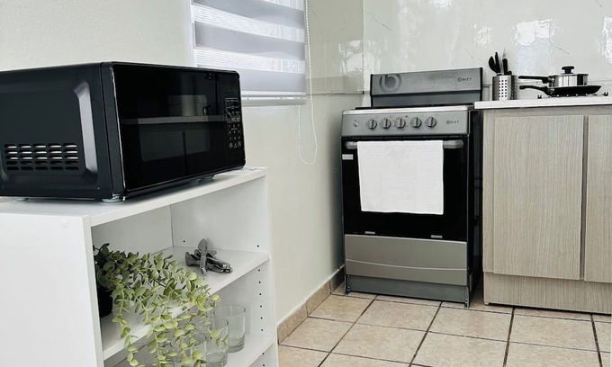 Celada Apartment | Tropical 2BR Apt +Priv Bath and Parking in Gurabo