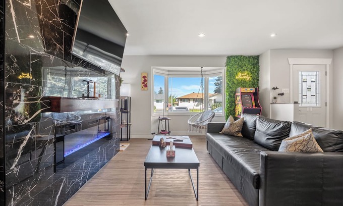 Northeast Edmonton House | Unique stay with retro arcade, free coffee/tea, and a spacious backyard patio