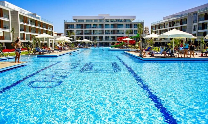 Trikomo Apartment | Delightful Studio Flat Close to the Beach with Shared Pool and Balcony in Iskele, Cyprus