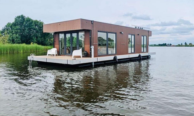 Oud Ade Boat Rental | Houseboat: "De Walvis" at Kagerplassen with tender. 4+ 2 kids