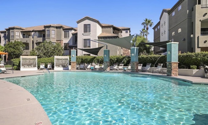 Glendale Sports and Entertainment District Apartment | CozySuites Glendale walk to stadium w/ pool & gym!