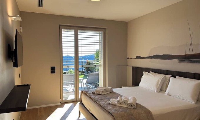 Civiglio Apartment | New stylish apartment with panoramic terrace and patio overlooking Lake Como.